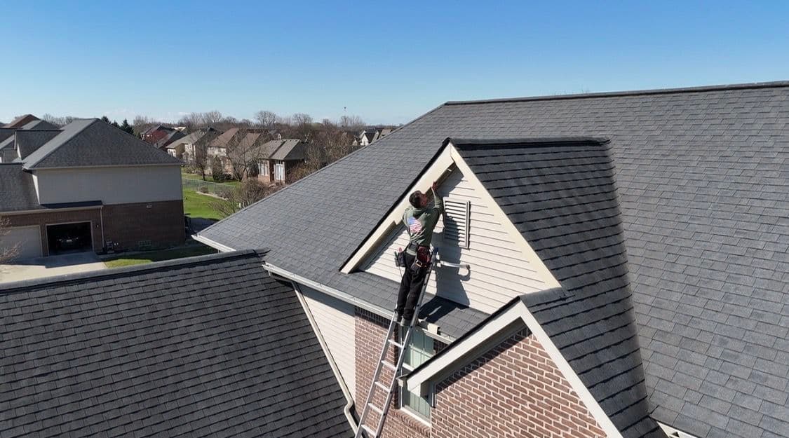 Storm-damaged roofline trim replaced on brick home image