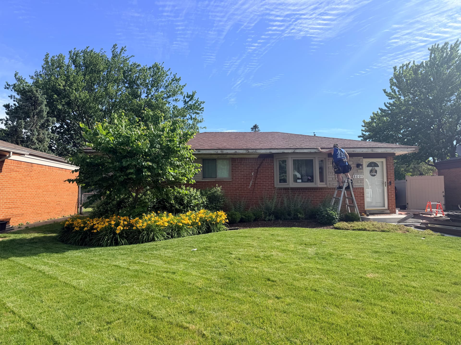 Trim and Siding Repair Underway on This Brick Ranch image