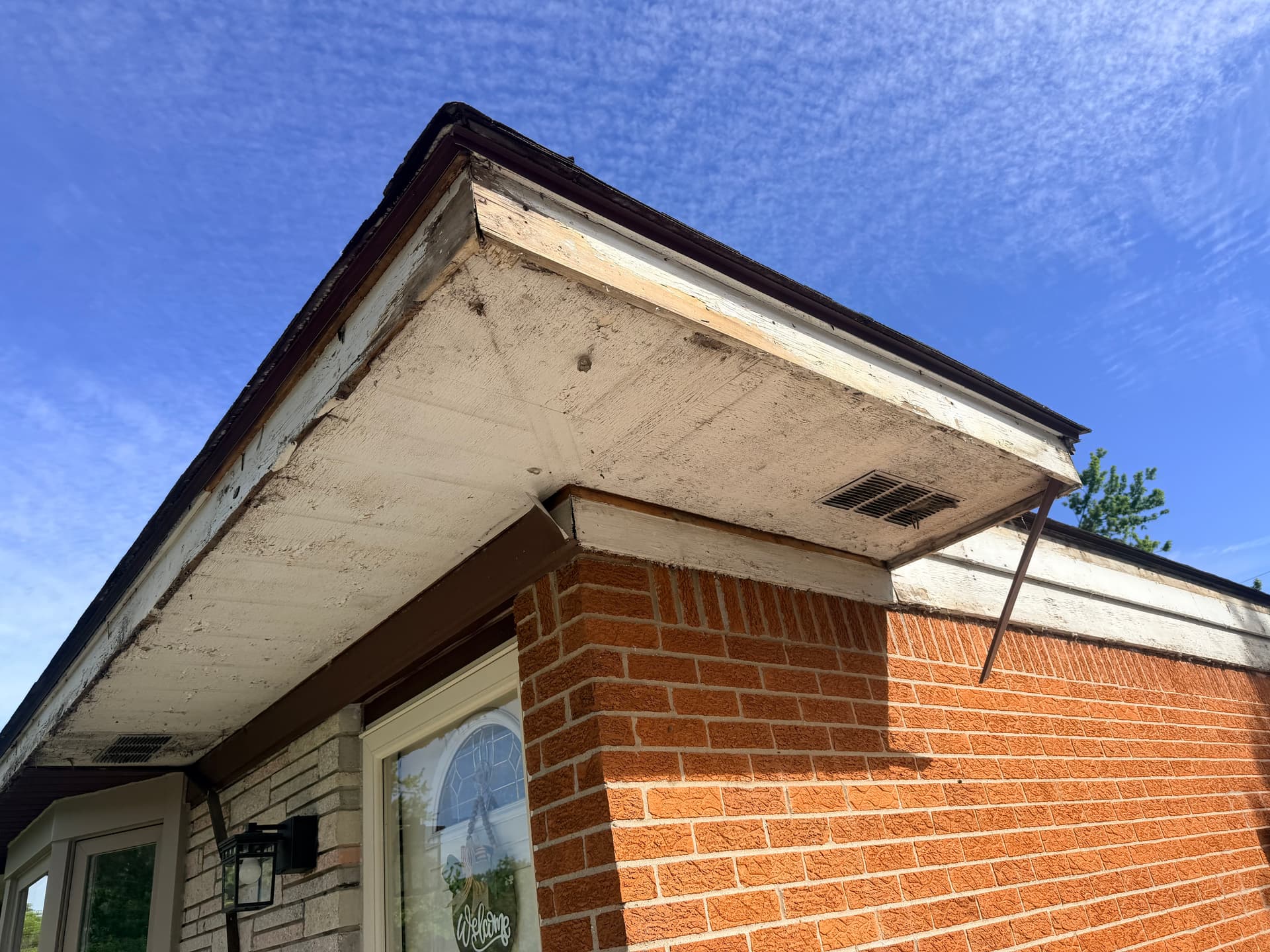 Gallery photos for Trim and Siding Repair Underway on This Brick Ranch: Image #1